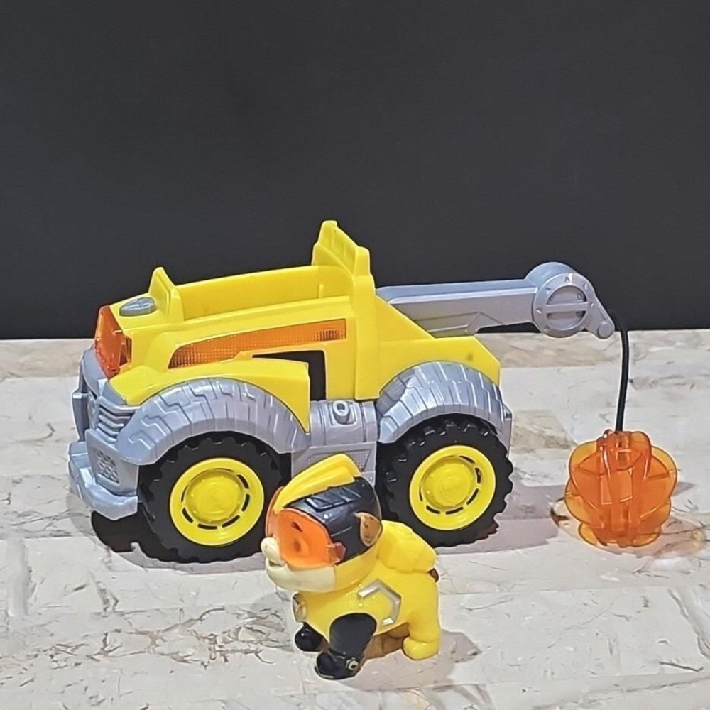 Paw Patrol Rubble Mighty Pups Super Paws Deluxe Vehicle with Figure Yellow Truck